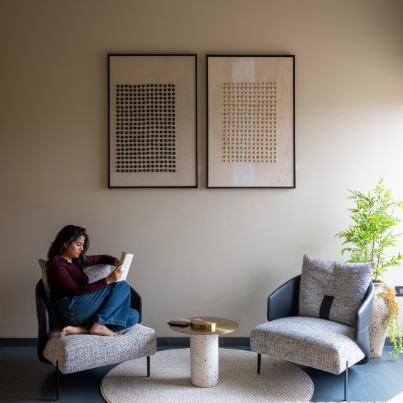 Woman reading in a styled interior